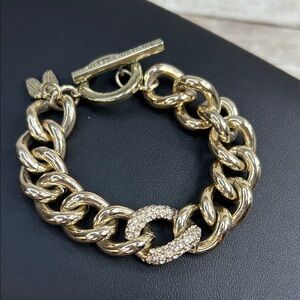 Victoria's Secret gold-tone curb chain bracelet with a pave set crystal link